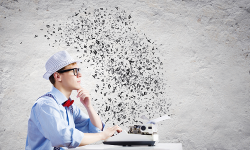 An illustration of a writer at a typewriter, with letters flying around him