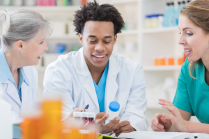 PT-1 Pharmacy Technician working in a Pharmacy
