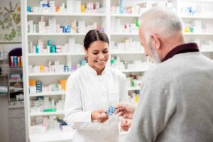 Pharmacist working with a customer